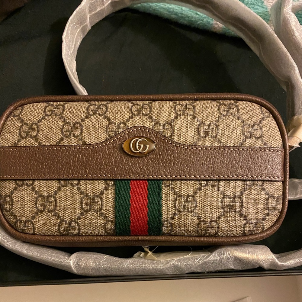 Mini bag. Very cute and authentic.